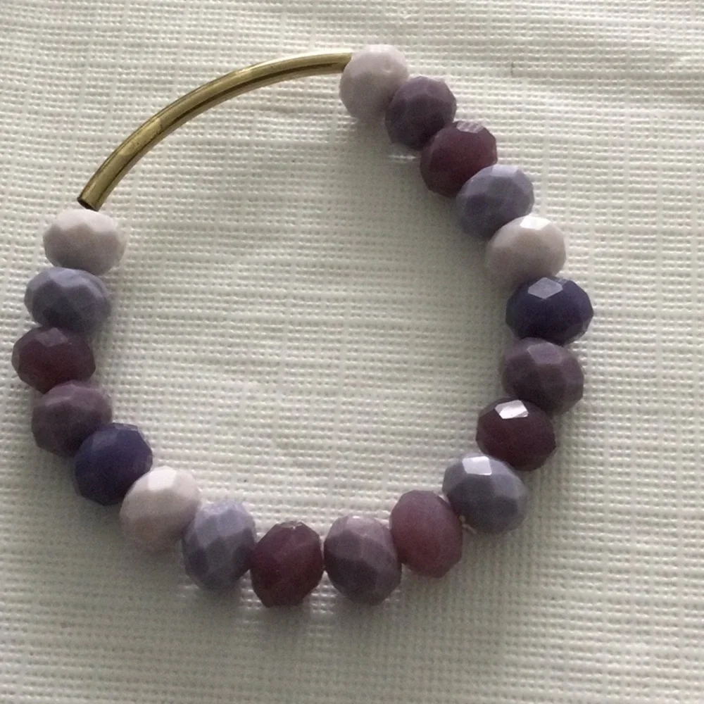 Woman’s Ann Taylor Loft Set of 4 Stretch Bracelets & one set of pierced Earrings